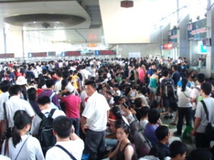 The sitaution is even worse in train stations.  Pictured here, the waiting hall for a train from Chengdu to Chongqing.